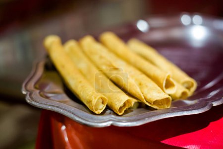 Photo for Fresh prepared flautas, taquitos . Traditional mexican cuisine made of fresh ingredients served in Ciudad de Mexico - Royalty Free Image