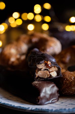 Photo for Crunchy nougats with honey and covered in chocolate - Royalty Free Image