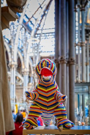 Photo for Multi coloured striped dinosaur toy on sale in the Oxford University Museum of Natural History, Oxford, Oxfordshire, UK on 25 March 2023 - Royalty Free Image