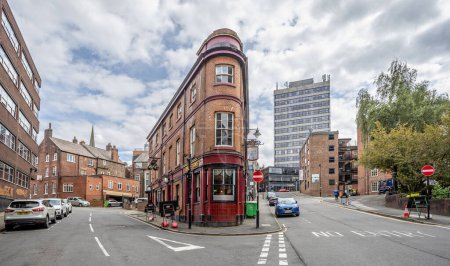 Photo for The distinctive triangular shape of the historic Three Tuns pub on corner of  Silver Street Head  and Lee Croft in Sheffield, South Yorkshire, UK on 24 July 2023 - Royalty Free Image