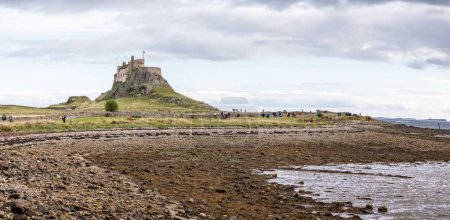 Photo for View of Lindisfarne Castle from coastal walkway  on Holy Island, Northumberland, UK on 22 September 2023 - Royalty Free Image