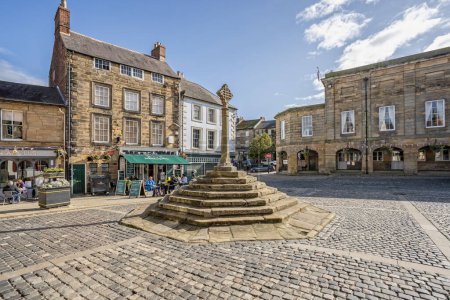 Photo for Medieval Alnwick stone market  cross in Alnwick Market place Alnwick, Northumberland, UK on 26 September 2023 - Royalty Free Image