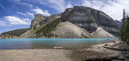 Photo for Panoramic view of azure blue coloured lake and mountains  at Moraine Lake, Rocky Mountains, Alberta, Canada on 5 June 2023 - Royalty Free Image