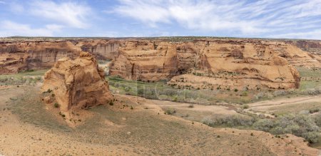 Photo for Panoramic view looking down into the sandstone walled canyon of Canyon de Chelly National Monument from the south rim in Arizona, USA on 18 April 2024 - Royalty Free Image