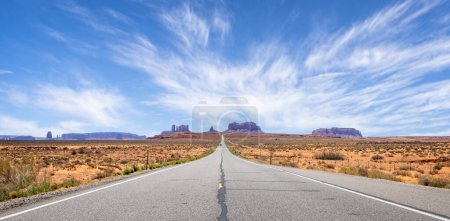 Classic view of Monument valley with Route 163 stretching out in the distance - Forrest Gump point - Utah, USA on 21 April 2024