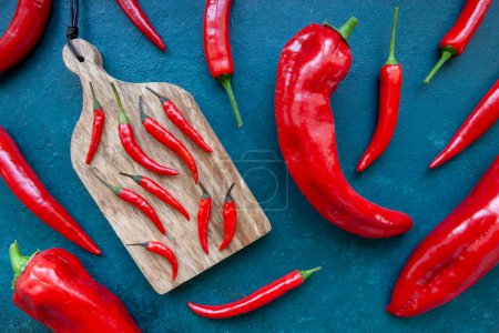 Photo for Fresh spicy chili peppers and paprika top view - Royalty Free Image