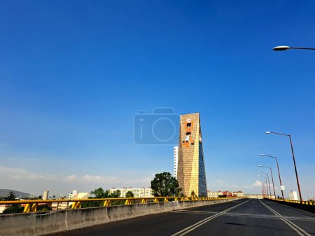 Photo for Mexico City, Mexico - Apr 06 2023: The Insignia Tower or Torre Banobras is a skyscraper in the shape of a triangular prism in Tlatelolco has the largest carillon in America - Royalty Free Image