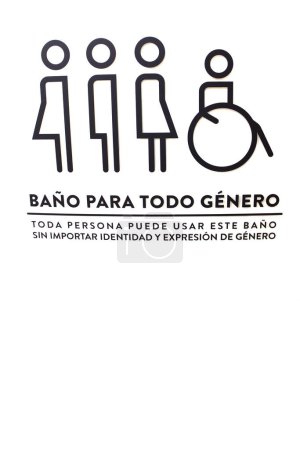 Photo for Sign of inclusive bathrooms for all genders in Spanish with the intention of combating discrimination against trans women and men, people with disabilities - Royalty Free Image