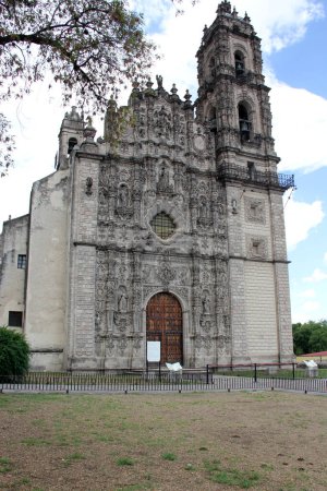 Photo for State of Mexico, Mexico - July 12, 2023: Temple of San Francisco Javier baroque New Spain part of the National Museum of the Viceroyalty in Tepotzotlan, magical town - Royalty Free Image
