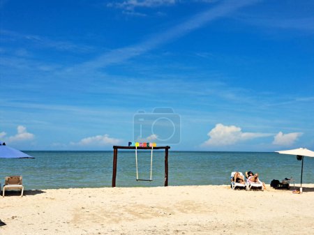 Photo for Progreso, Yucatan, Mexico - Nov 23 2022: Malecon in the peninsula port city is a cruise ship stop on its iconic long pier lined with thatched-roof beaches and restaurants - Royalty Free Image