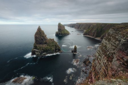 Photo for A landscape shot of some coastal stacks at Duncansby in Caithness Scotland. Duncansby Stacks, Scotland, UK. High quality photo. - Royalty Free Image