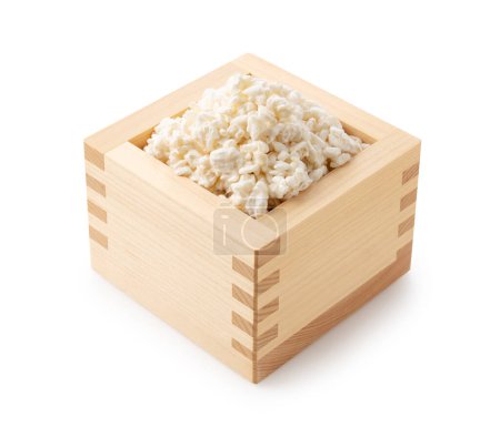 Photo for Rice koji in a box placed on a white background. Koji mold. Koji is fermented rice. - Royalty Free Image