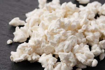 Photo for Close-up of rice koji placed on black background. Koji. Koji is fermented rice. - Royalty Free Image