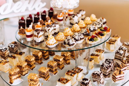 Photo for Delicious sweets on candy buffet. Wedding. Reception. - Royalty Free Image