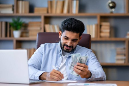 Photo for Business, finances, accounting and people concept - man with money and calculator filling papers at the office - Royalty Free Image