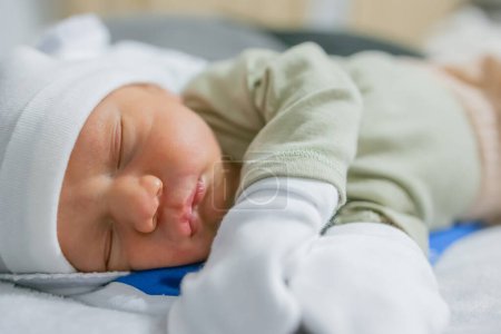 Photo for Newborn baby sleep first days of life. Cute little newborn child sleeping peacefully - Royalty Free Image