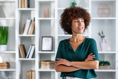 Photo for Successful confident black business woman. Beautiful young African American woman with curly hair wearing casual clothes. copy space - Royalty Free Image