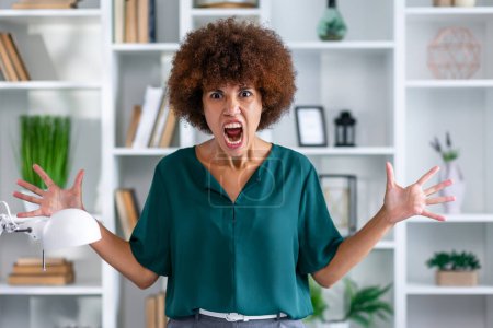 Photo for Young angry sad dissatisfied displeased nervous woman of African American ethnicity scream - Royalty Free Image