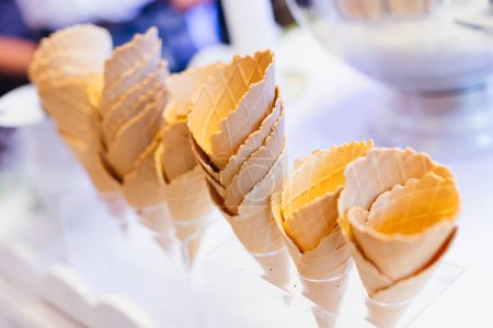 Photo for Waffle cones for ice cream bar on wedding reception. - Royalty Free Image