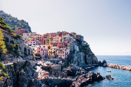 Photo for View of colorful houses of traditional Italian architecture. small town on a rocky shore of the ocean. Italy. - Royalty Free Image