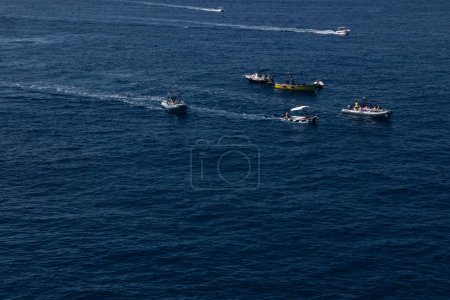 Photo for Many boats with tourists sailing on the sea. sea trip. - Royalty Free Image