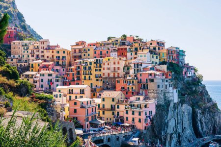 Photo for View of colorful houses of traditional Italian architecture. small town on a rocky shore of the ocean. Italy. - Royalty Free Image
