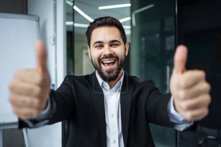 Photo for Happy caucasian business man corporate employee demonstrate sign good result success in work applaud - Royalty Free Image