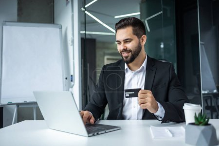 Photo for Happy man, business credit card and laptop for ecommerce, finance and accounting in office. Manager, computer and financial payment of budget - Royalty Free Image