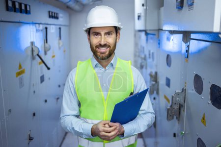 happy man and engineering technician in control room, inspection service or industry maintenance. Electrician in substation system