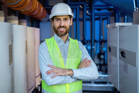 Foto de Portrait of Professional Contractor Technic in Hard Hat or Safety Wear or Engineer Worker Wearing Uniform in Boiler Room. - Imagen libre de derechos