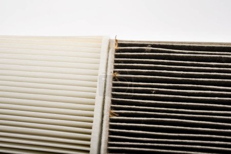 Photo for Comparison of a ditry and clean cabin filter in the car - Royalty Free Image