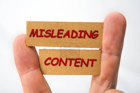 Photo for Misleading and fabricated content sign on a white - Royalty Free Image