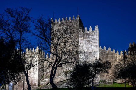 Beautiful night time view of Guimaraes Castle in Guimaraes, Portugal