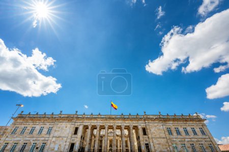 National Capitol in Bogota, Colombia with a bright blue sky and the sun visible