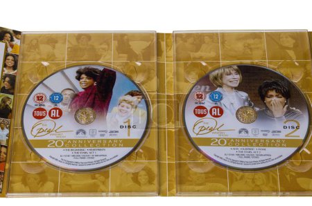 Foto de Close-up view of two DVD inside Oprah Winfrey 20th anniversary box collection. Sweden. Uppsala. 02.02.2023. - Imagen libre de derechos