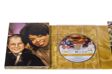 Photo for Close up view of disc 4 of 20th anniversary DVD set box of Oprah Winfrey show. Sweden. Uppsala. 03.04.2023. - Royalty Free Image