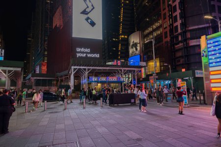Photo for Night Manhattan cityscape view. Tourists taking pictures. New York. USA. 09.22.2022 - Royalty Free Image