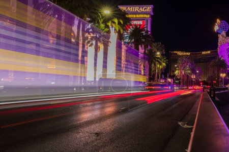 Photo for Gorgeous out-of-focus colorful tracers of Strip road. Night Las Vegas cityscape view. Nevada, Las Vegas. USA. - Royalty Free Image