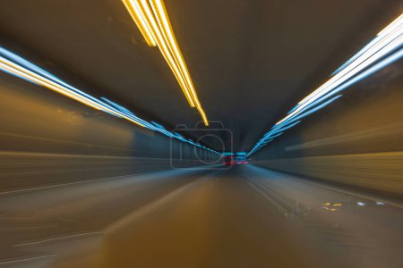 Photo for Gorgeous out-of-focus colorful tracers of tunnel road lights. Abstract backgrounds. Sweden. Stockholm. - Royalty Free Image