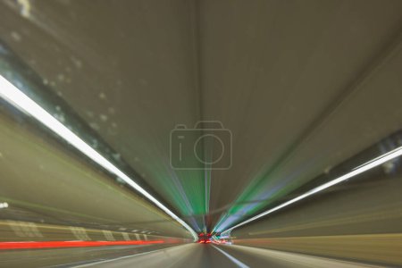 Photo for Beautiful view of  out-of-focus colorful tracers of tunnel road lights. Abstract backgrounds. Sweden. Stockholm. - Royalty Free Image