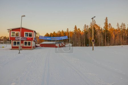 Photo for Beautiful view of winter landscape with ski tracks and building of ski sports club. - Royalty Free Image