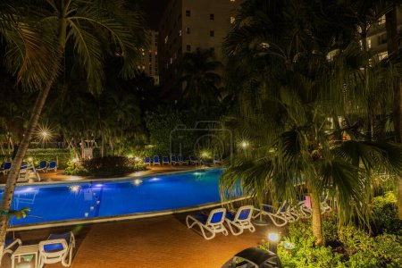 Photo for Beautiful aerial view of the Radisson hotel pool, illuminated during night time. Miami Beach. USA. - Royalty Free Image