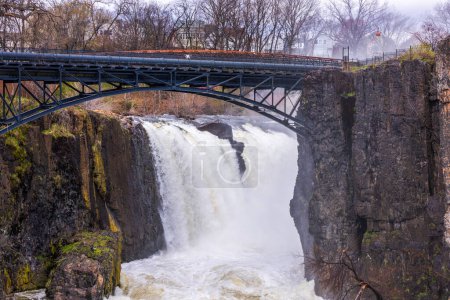 Close-up view of the majestic Paterson Waterfall cascading in New Jersey, USA.