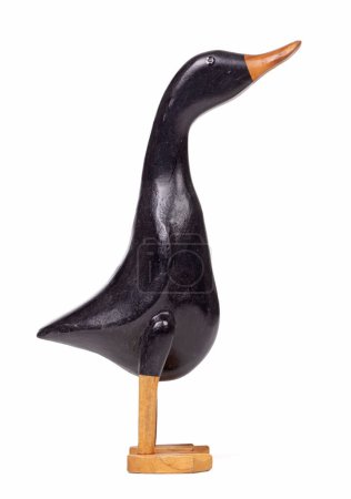 Foto de Divertido pato negro de madera sobre un fondo blanco - Imagen libre de derechos