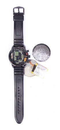 Broken smartwatch isolated on a white background