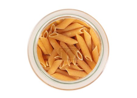 Pasta Penne Rigate (whole-weat pasta), isolated on white
