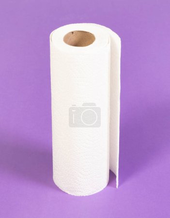 White kitchen paper isolated on a purple background