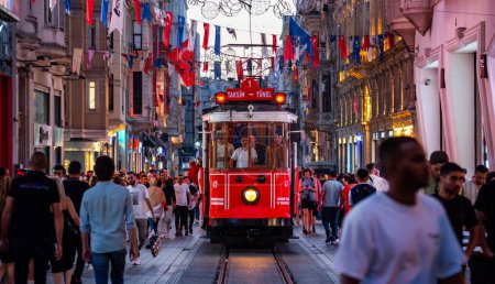 Photo for Istanbul, Turkey - September 23, 2023: Nostalgic Red Tram of Istanbul. Historic tram in Taksim Istiklal Street. Touristic popular destination Taksim Istiklal Street. Beyoglu, Istanbul, Turkey. - Royalty Free Image