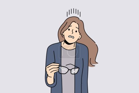 Woman with broken glasses in hands makes confused face not knowing how to solve vision problem. Careless girl holds glasses with cracked glass and needs to go to optometrist or buy contact lenses