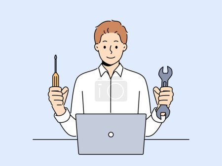 Illustration for Man repairs laptop after breakdown and holds screwdriver and wrench in hands, working as system administrator. Guy fixes laptop or wants to upgrade by replacing hard drive of computer - Royalty Free Image